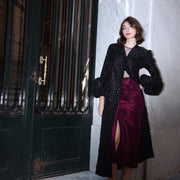 Top con transparencias y lunares negro